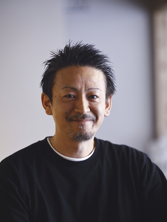 石川　孝三 氏