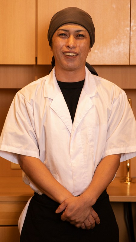 前里　徳臣 氏