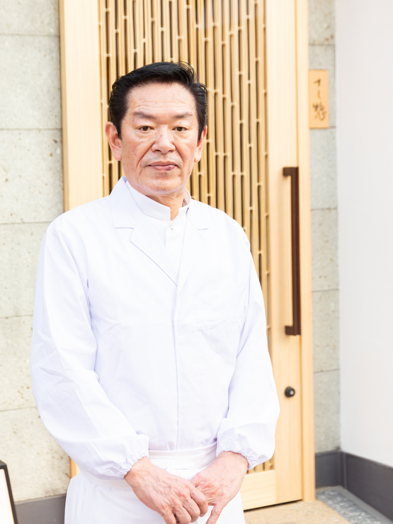 石橋　達男 氏