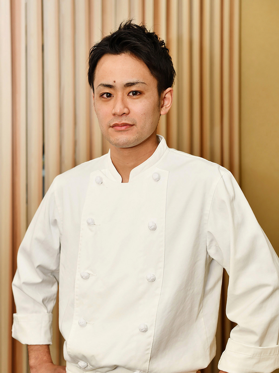 堤　優大 氏