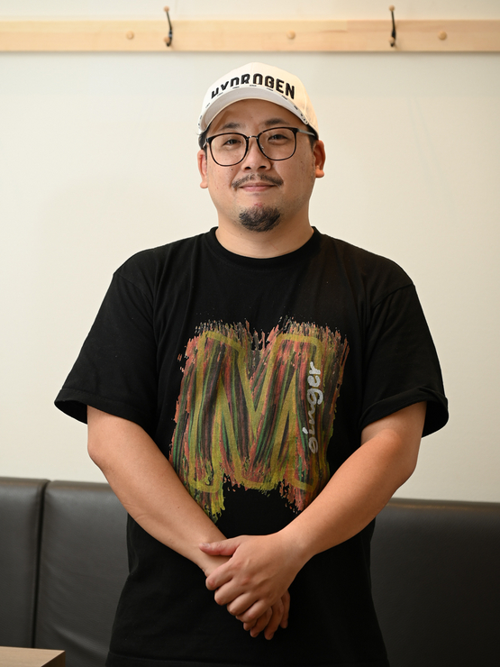 永井　賢一 氏