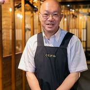 武冨　義信 氏