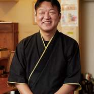 柏原　康範 氏
