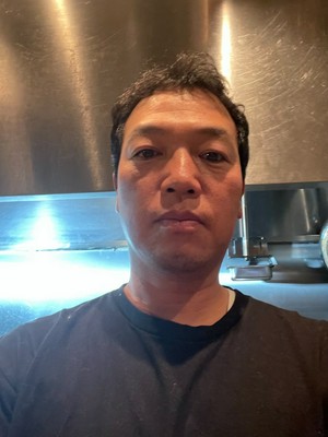 梁　堅次 氏
