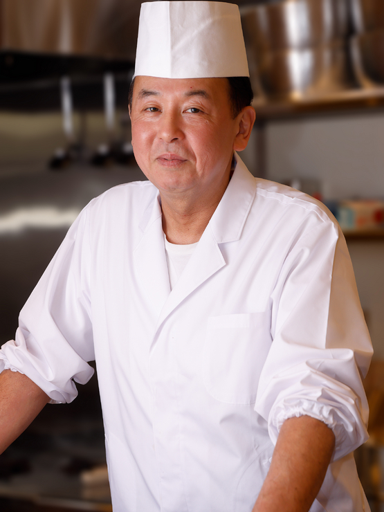 中下　義雄 氏