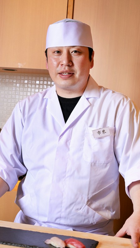 市來　隆司 氏