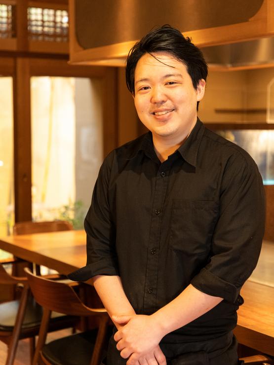 岸井　拓也 氏