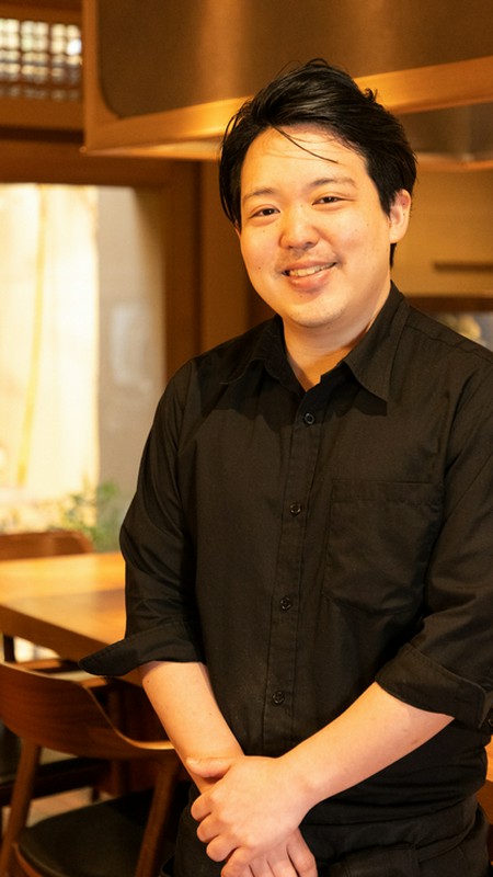 岸井　拓也 氏
