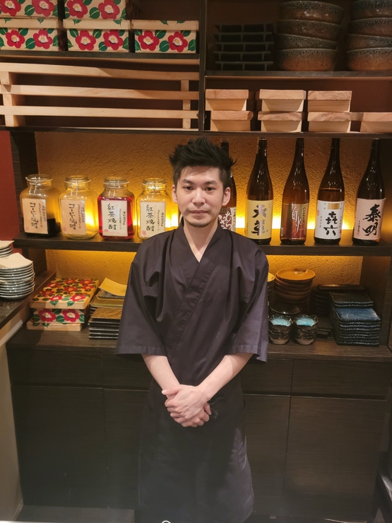 我妻　祐樹 氏
