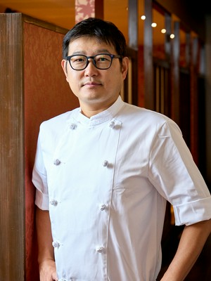 安　成達 氏