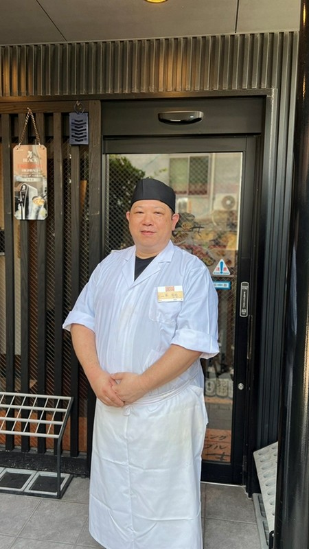 峯　栄治 氏