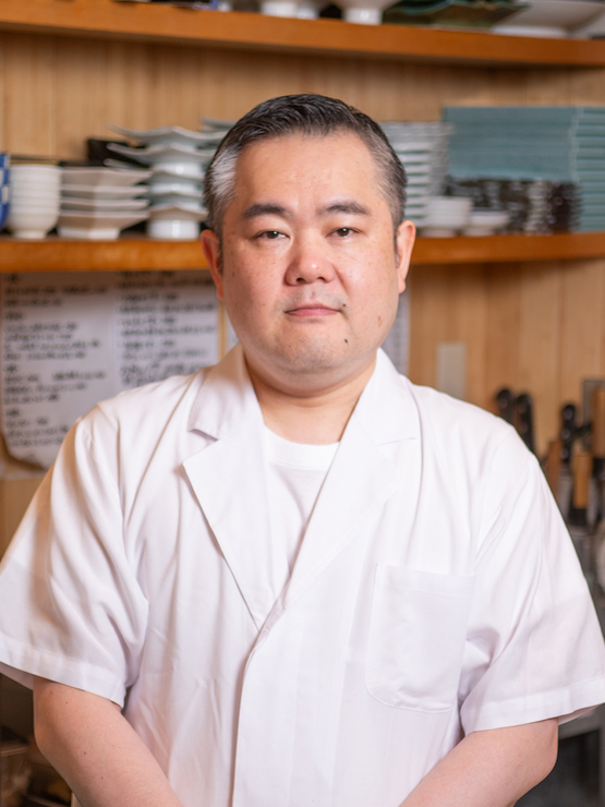 中村　吉成 氏