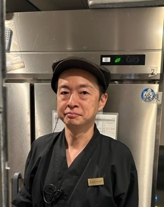 神前　賢一 氏