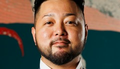 高良　盛将 氏